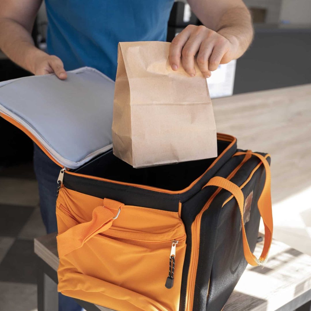man-preparing-takeaway-food-delivery